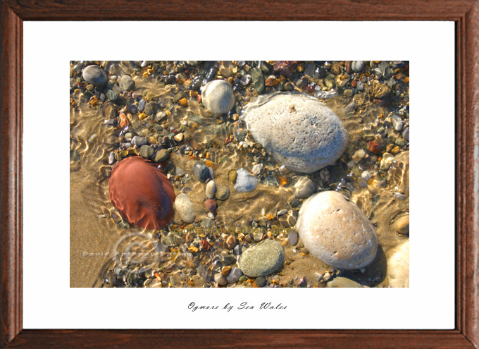 photo of ogmore by sea pebbles in water