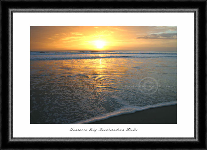 photo of golden foamy sunset at southerndown bay in wales uk