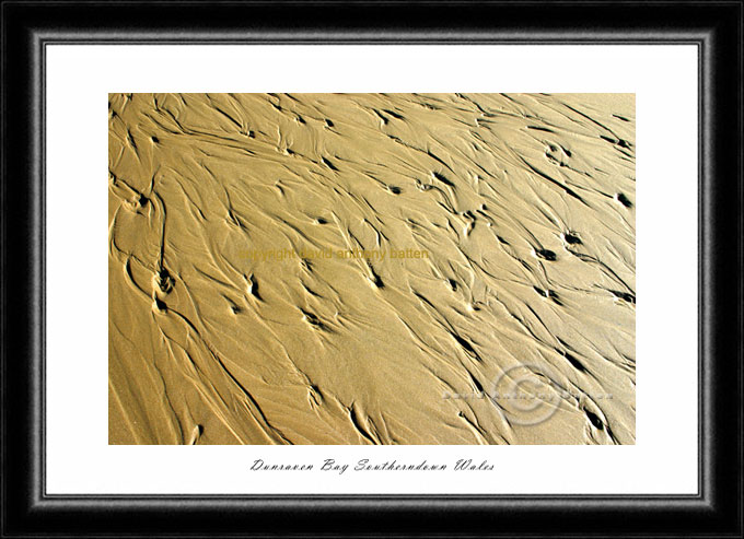 photo of water marks on sand at southerndown bay wales by poet and photographer david anthony batten